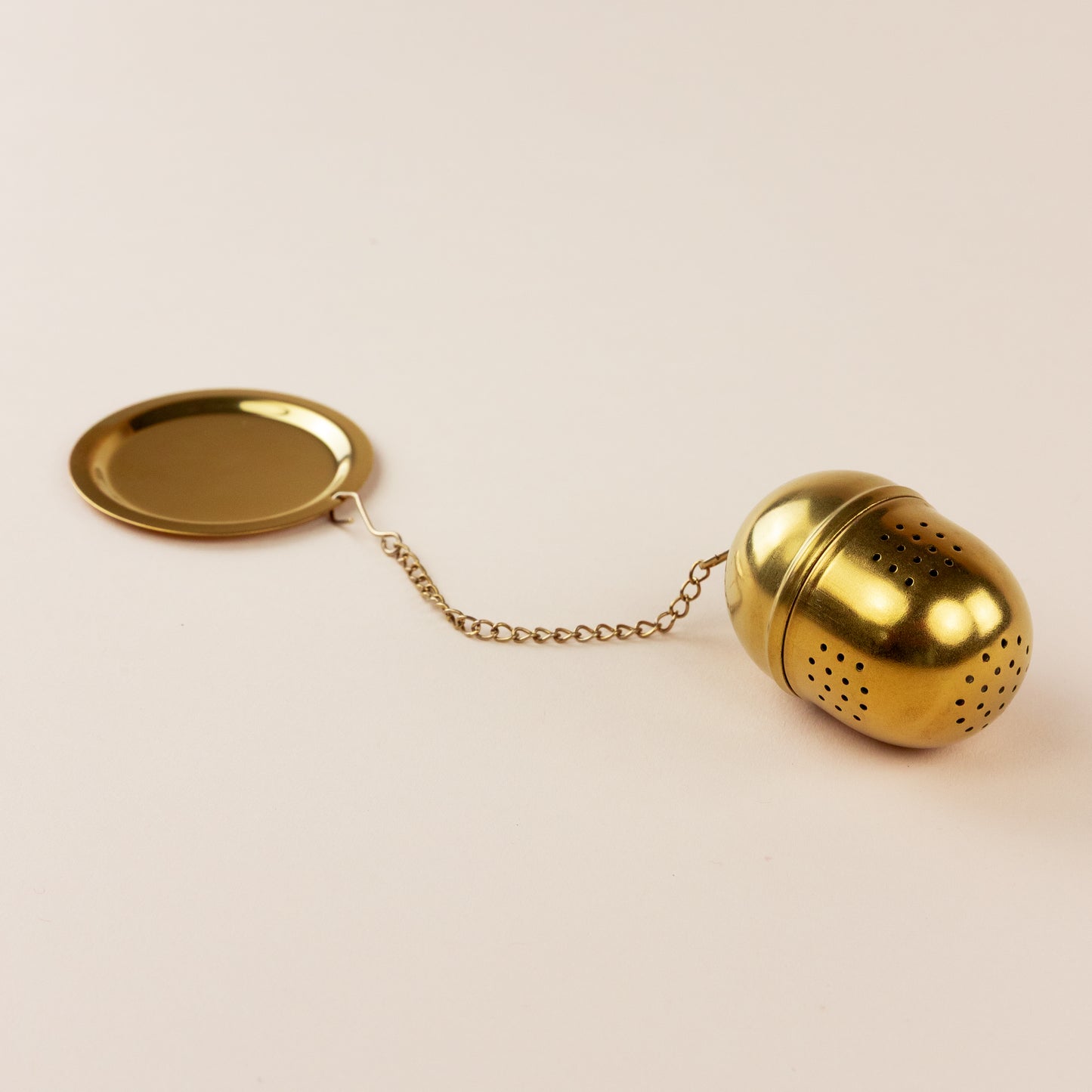 Stainless Steel Golden Tea Egg With Chain & Resting Tray