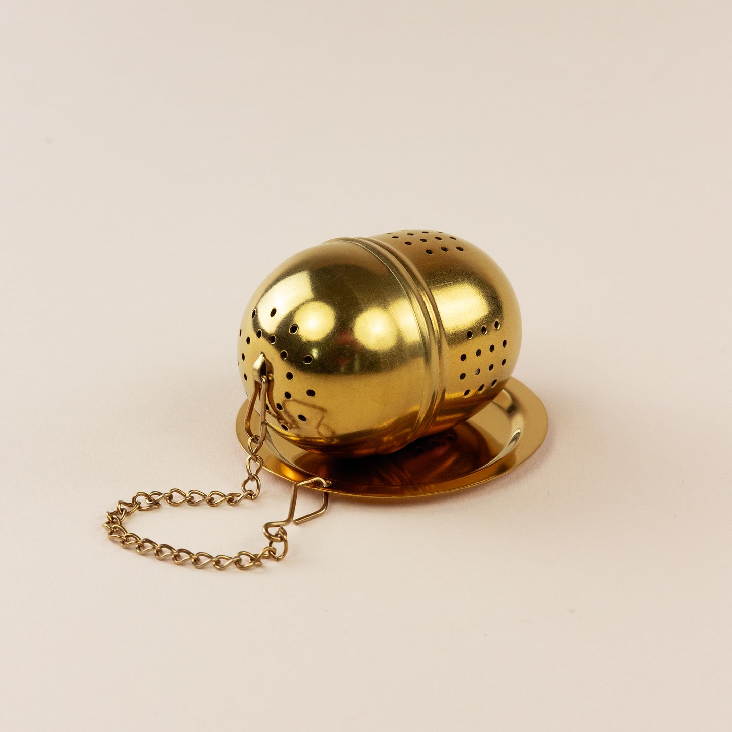 Stainless Steel Golden Tea Egg With Chain & Resting Tray
