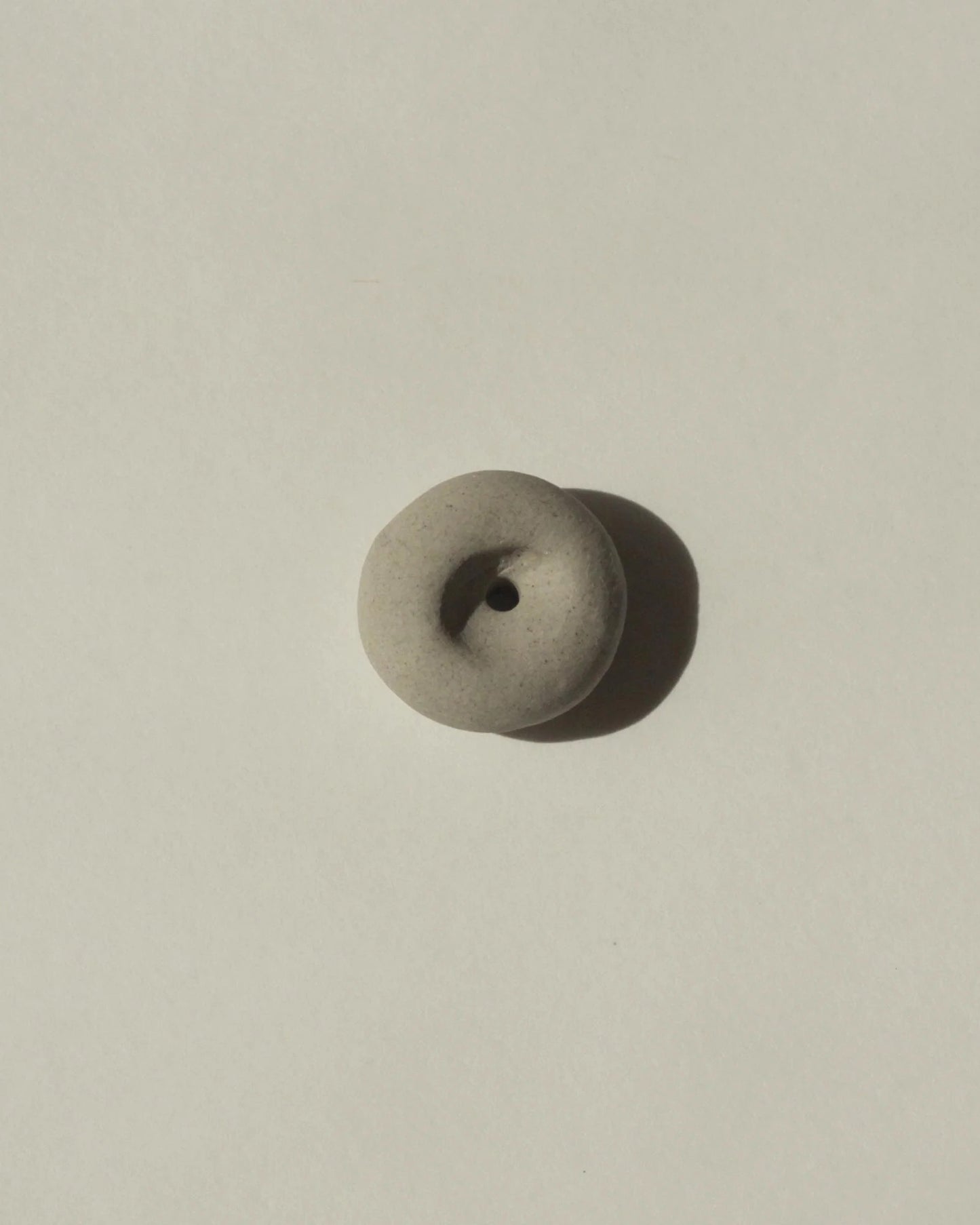Cedar and Myrrh Mini Light Grey Ceramic Pebble Incense Holder Lifestyle 2