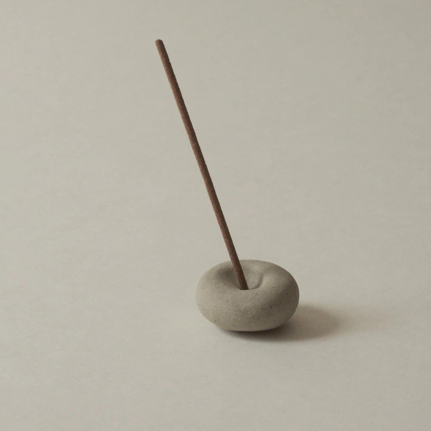 Cedar and Myrrh Mini Light Grey Ceramic Pebble Incense Holder Lifestyle 4