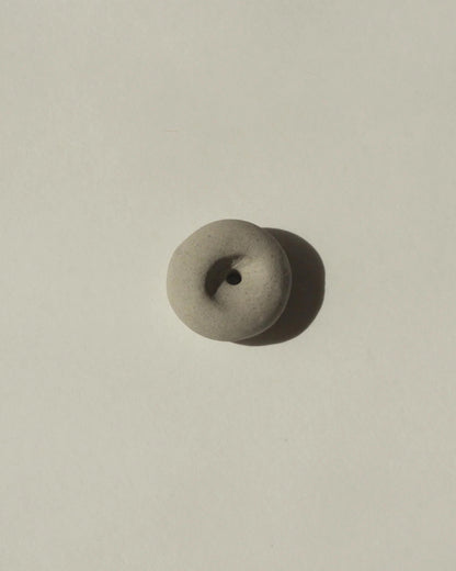 Cedar and Myrrh Mini Light Grey Ceramic Pebble Incense Holder Lifestyle 2