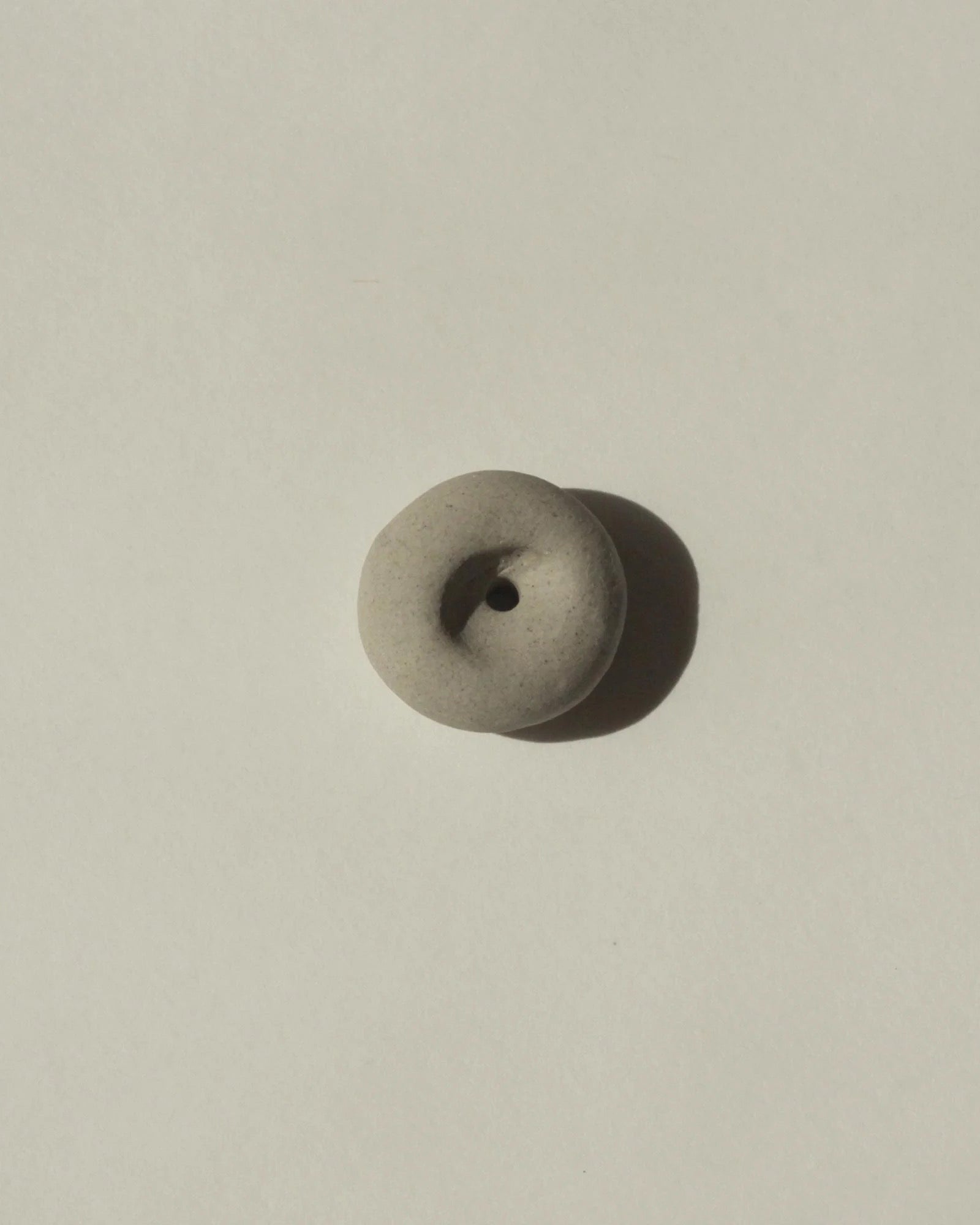 Cedar and Myrrh Mini Light Grey Ceramic Pebble Incense Holder Lifestyle 2