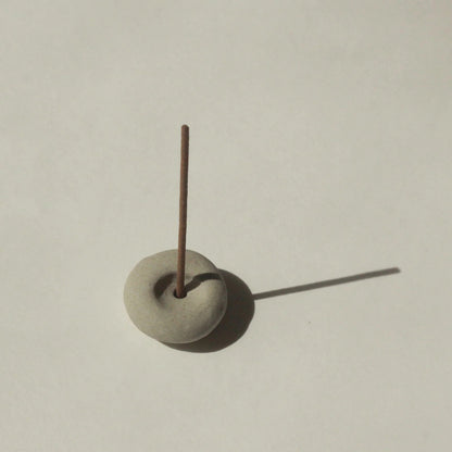 Cedar and Myrrh Mini Light Grey Ceramic Pebble Incense Holder Lifestyle 3